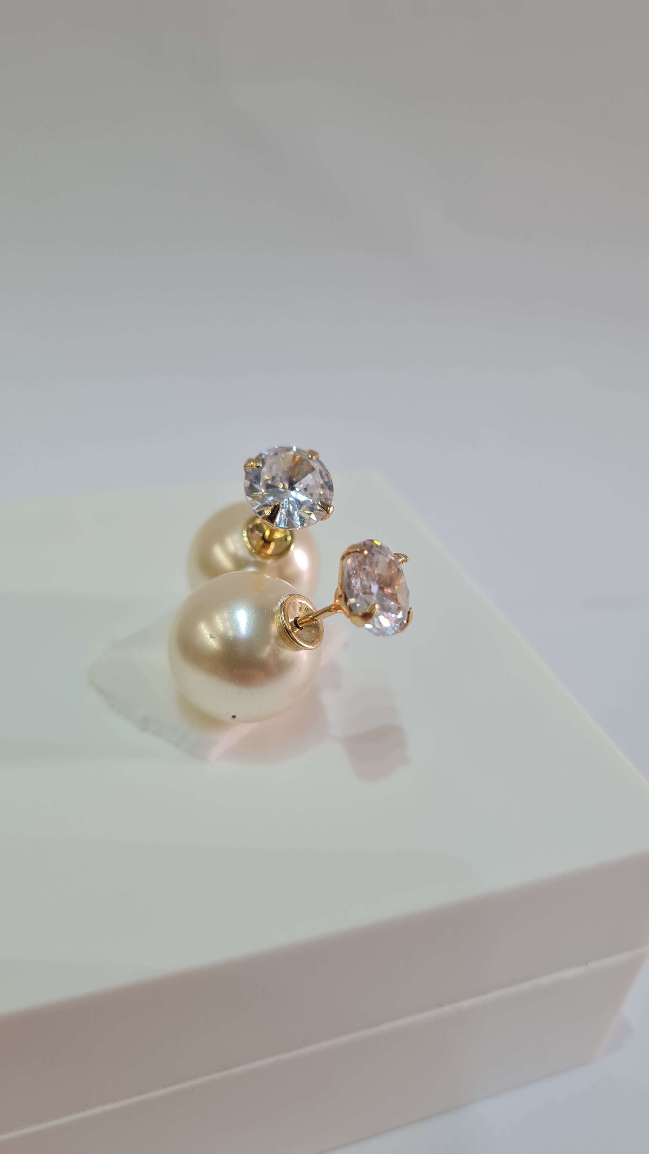 Brinco Perola Ponto de Luz