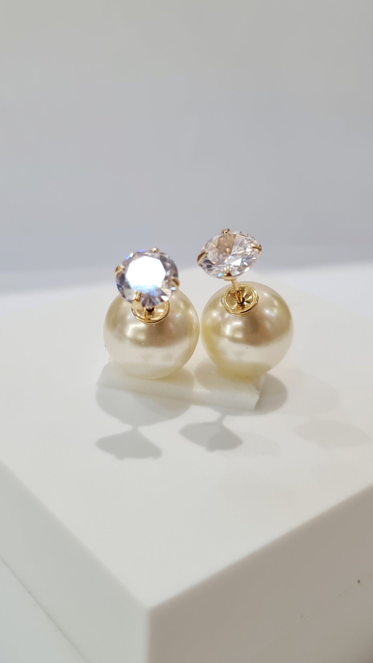 Brinco Perola Ponto de Luz